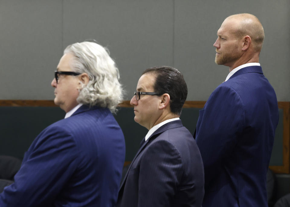 Daniel Rodimer, right, appears in court with his attorneys David Chesnoff, left, and Richard Schonfeld during his arraignment at the Regional Justice Center in Las Vegas, Wednesday, May 8, 2024. Rodimer, a retired professional wrestler and former congressional candidate, was indicted on a murder charge in the death of a man during a party at a Las Vegas Strip hotel. (Bizuayehu Tesfaye/Las Vegas Review-Journal via AP)
