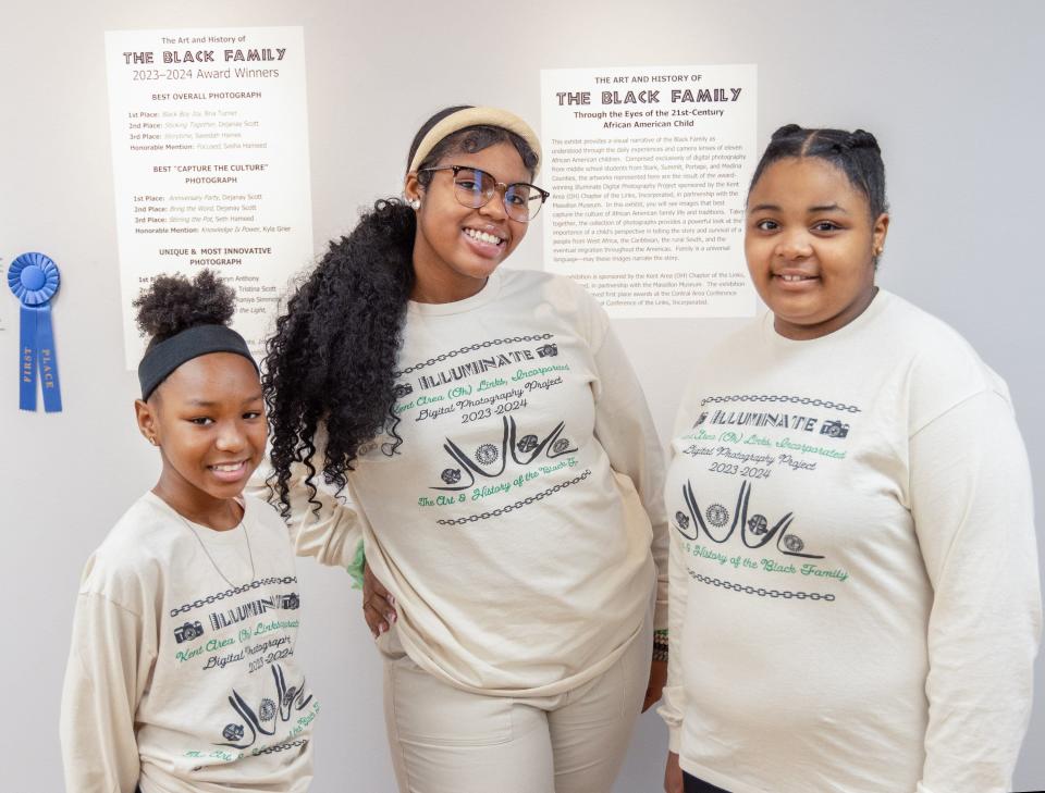 Overall Best Photograph category winners in the Illuminate Digital Photography Project were Saeedah Haines, third place for “Story Time,” from left; Bria Turner, first place for “Black Boy Joy;" and Dejanay Scott, second place for “Sticking Together.”