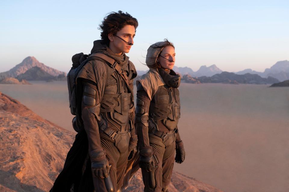 Timothée Chalamet, left, and Rebecca Ferguson in a scene from "Dune."