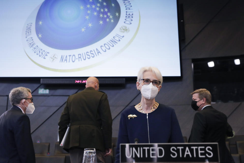 United States Deputy Secretary of State Wendy Sherman, second right, prepares to take her seat prior to the NATO-Russia Council at NATO headquarters, in Brussels, Wednesday, Jan. 12, 2022. Senior NATO and Russian officials are meeting Wednesday to try to bridge seemingly irreconcilable differences over the future of Ukraine, amid deep skepticism that Russian President Vladimir Putin's security proposals for easing tensions are genuine. (Olivier Hoslet, Pool Photo via AP)