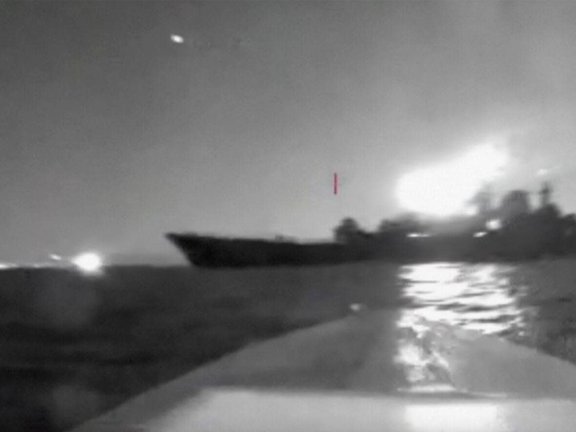 In this image taken from video released on Friday, Aug. 4, 2023, a drone manoeuvres as it approaches a vessel claimed to be a Russian large landing ship, the Olenegorsky Gonyak, close to the Black Sea port of Novorossiysk. (Associated Press - image credit)