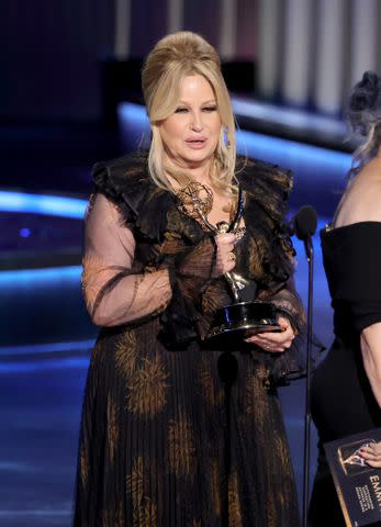 <p>Kevin Winter/Getty Images</p> Jennifer Coolidge accepts her award at the 2023 Emmy Awards