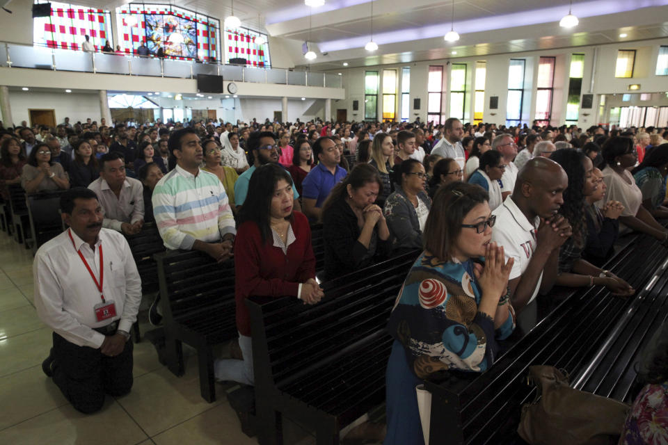 In this Sunday, Jan. 20, 2019 photo, parishioners attend Mass at St. Mary's Catholic Church in Dubai, United Arab Emirates. Pope Francis’ visit to the United Arab Emirates from Feb. 3 through Feb. 5, marks the first ever papal visit to the Arabian Peninsula, the birthplace of Islam. The Catholic Church believes there are some 1 million Catholics in the UAE today. The backbone of that population is Filipino and Indian. (AP Photo/Jon Gambrell)