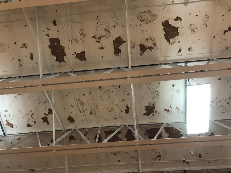 The ceiling in the Utica Middle School gym continues to flake paint onto the gym floor.