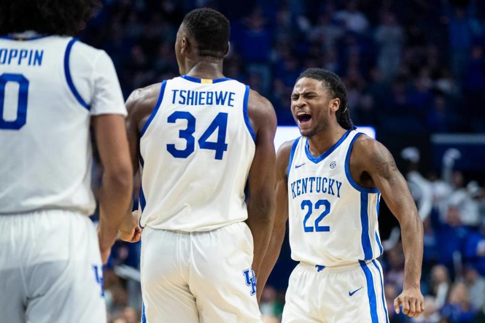 Kentucky guard Cason Wallace (22) celebrates after forward Oscar Tshiebwe (34) scored and drew a foul against Georgia during a game at Rupp Arena on Jan. 17.