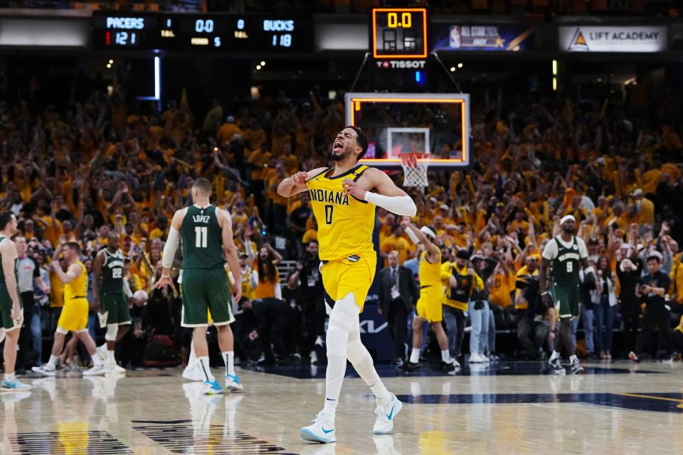 Tyrese Haliburton celebrates after the Pacers edged the Bucks in overtime in Game 3 of the teams' first-round playoff series.