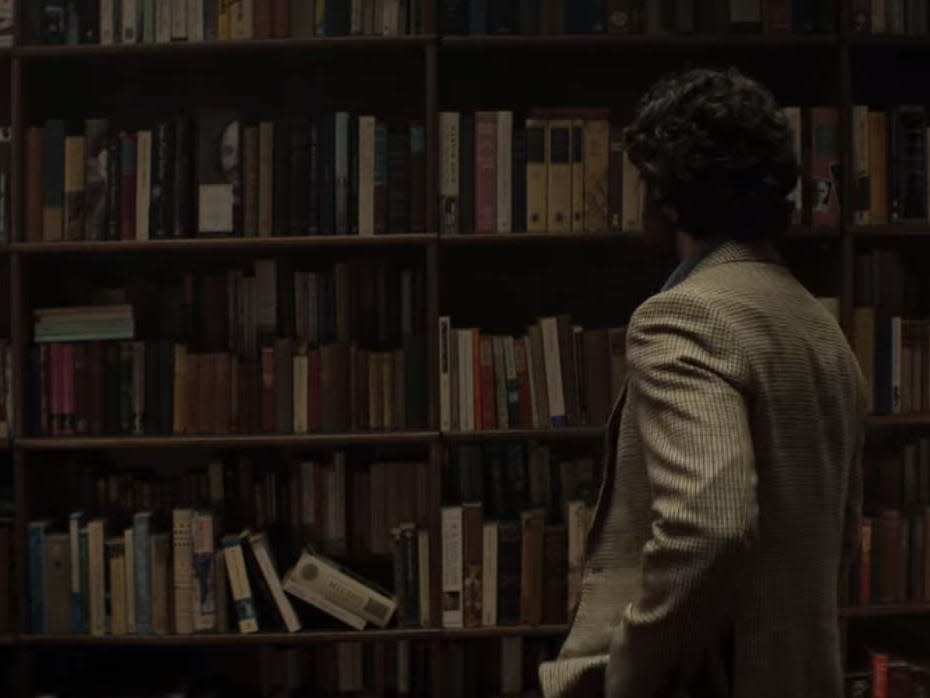joe in front of bookshelf season four