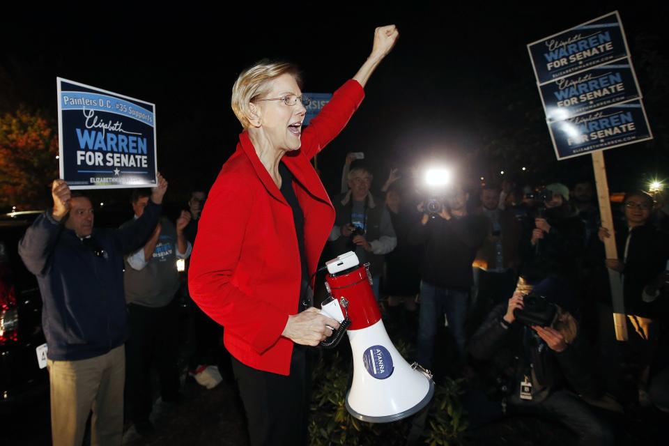 Sen. Elizabeth Warren greets supporters before a debate with her Republican opponent Geoff Diehl in Boston, Friday, Oct. 19, 2018. (AP Photo/Michael Dwyer)