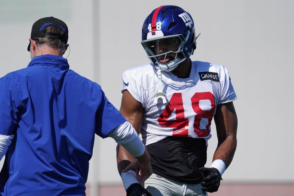 Jul 26, 2024; East Rutherford, NJ, USA; New York Giants linebacker Benton Whitley (48) gets instruction during training camp at Quest Diagnostics Training Center. Mandatory Credit: Lucas Boland-USA TODAY Sports