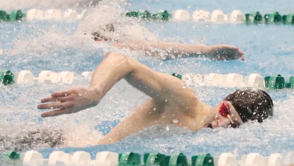 Aurora's Cameron Good competes in the final heat of the boys 100 freestyle at the Northeast District meet at Robert F. Busbey Natatorium at Cleveland State University on Friday, Feb. 16, 2024.