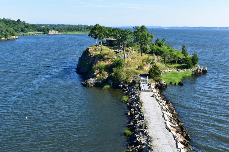 Whortleberry Island, just off shore in East Providence, where clambakes were held from 1843 to 1870, when the island's owner prohibited them, causing attendees to migrate onto the mainland.