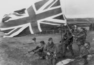 The Union Flag flies over Port Howard for the first time in more than two months- signifying the end of the Falklands conflict. Picture- Corbis Images.