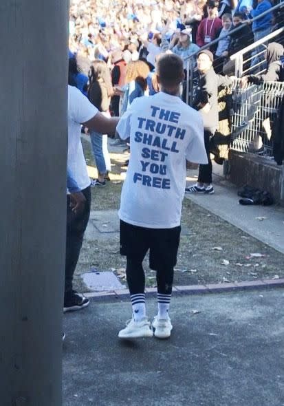 The 23-year-old Canadian popstar was seen dancing amongst the crowd, wearing a white T-shirt printed with the message, 