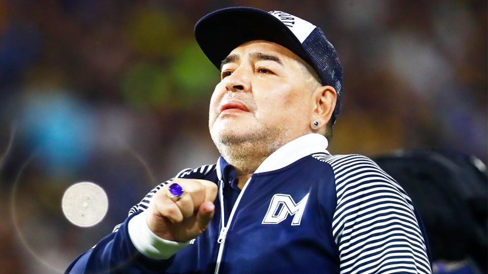 Diego Maradona (pictured) celebrating to the fans.