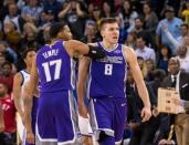 Nov 27, 2017; Oakland, CA, USA; Sacramento Kings guard Bogdan Bogdanovic (8) celebrates with guard Garrett Temple (17) after scoring a basket against the Golden State Warriors during the fourth quarter at Oracle Arena. Mandatory Credit: Kelley L Cox-USA TODAY Sports