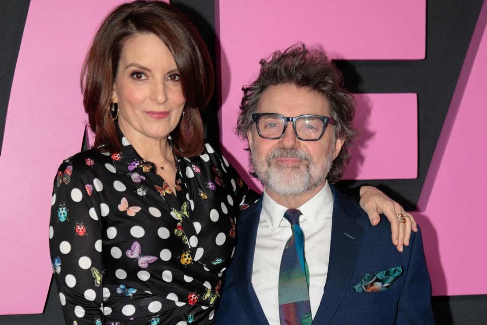 <p>KENA BETANCUR/getty</p> Tina Fey and husband Jeff Richmond at the "Mean Girls" premiere