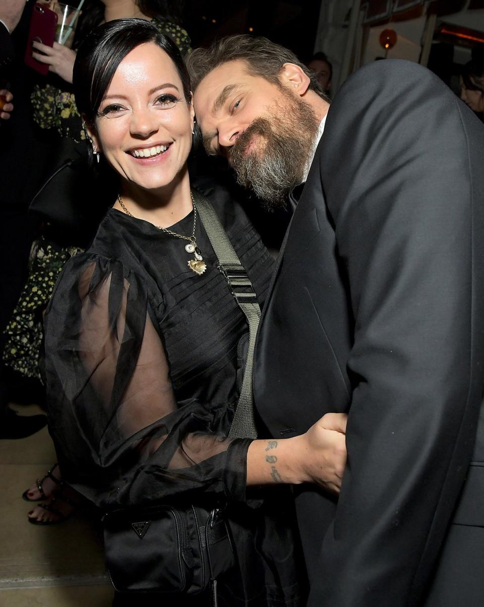 Lily Allen and David Harbour — <a href="https://people.com/awards/sag-awards-2020-cutest-couples-on-the-red-carpet/" rel="nofollow noopener" target="_blank" data-ylk="slk:who made their red carpet debut at the awards;elm:context_link;itc:0;sec:content-canvas" class="link ">who made their red carpet debut at the awards</a> — looked super cozy at the Netflix after-party. 