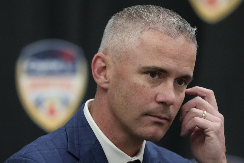 Florida State head coach Mike Norvell listens during a press conference one day ahead of the Orange Bowl NCAA college football game, in Dania Beach, Friday, Dec. 29, 2023. Georgia and Florida State will play in the Orange Bowl Saturday at Hard Rock Stadium in Miami Gardens. (AP Photo/Rebecca Blackwell)