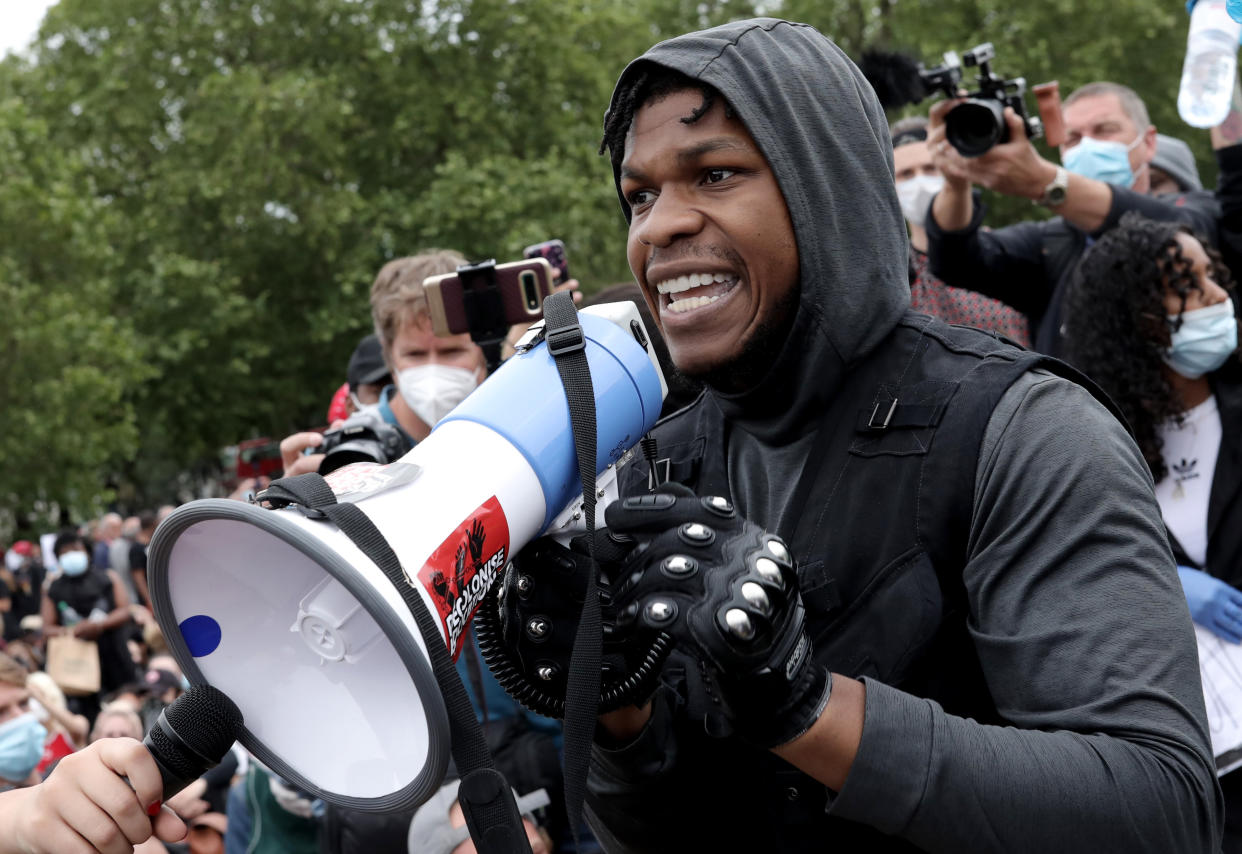 LONDON, ENGLAND - JUNE 03: Actor John Boyega speaks to the crowd during a Black Lives Matter protest in Hyde Park on June 3, 2020 in London, United Kingdom. The death of an African-American man, George Floyd, while in the custody of Minneapolis police has sparked protests across the United States, as well as demonstrations of solidarity in many countries around the world. (Photo by Dan Kitwood/Getty Images)