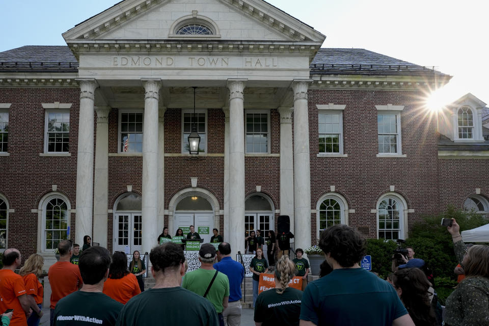 Survivors of the 2012 Sandy Hook Elementary School shooting are joined by family, activists, and supporters at a rally against gun violence on Friday, June 7, 2024 in Newtown, Conn. (AP Photo/Bryan Woolston)