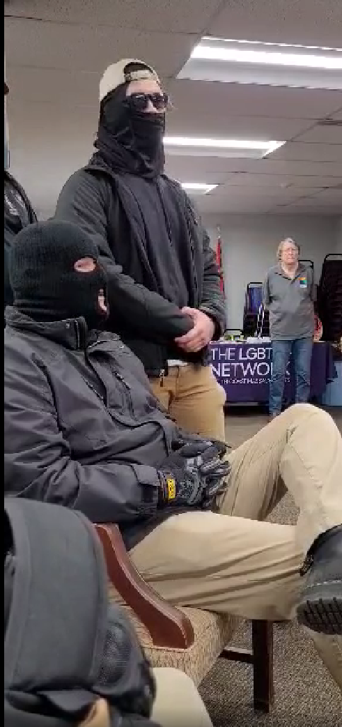 Members of NSC-131, wearing ski masks, disrupted a drag queen story hour at the Taunton Library on Saturday, Jan. 14, 2023.