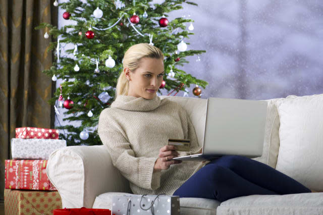 Woman shopping online for Christmas gifts