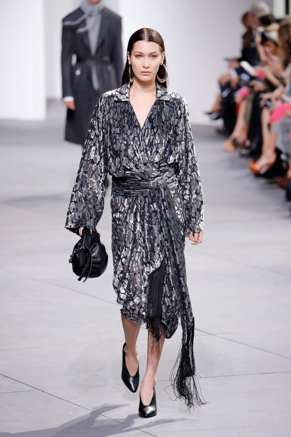 <p>Bella did 80s luxe workwear at Michael Kors AW17 at NYFW</p>