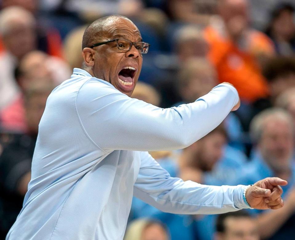 North Carolina coach Hubert Davis directs his team on defense during the second half against Virginia during the third round of the ACC Tournament on Thursday, March 9, 2023 at the Greensboro Coliseum in Greensboro, N.C.