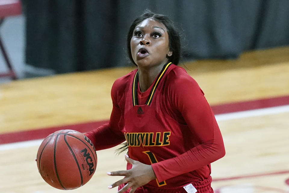 Louisville guard Dana Evans (1) is shown during an NCAA college basketball game against Boston College, Thursday, Feb. 4, 2021, in Boston. Dana Evans once pondered transferring from Louisville before understanding that the opportunities would come. The senior guard has maximized them with ACC championships and her second conference player of the year selection this week. (AP Photo/Elise Amendola)