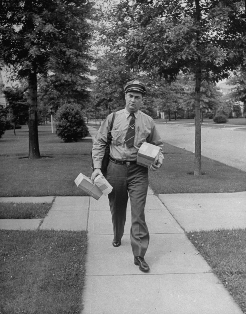 A United States Postal Service worker in Garden City, Kansas, circa 1942.