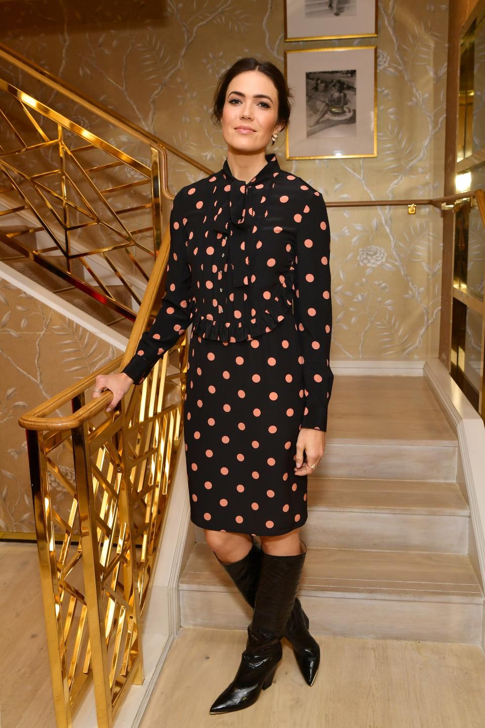 Mandy Moore is wearing the Resort 2020 Printed Ruffle Bow Dress and Lila Knee Boot.