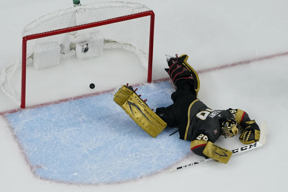 Vegas Golden Knights goaltender Marc-Andre Fleury (29) is scored on by Montreal Canadiens right wing Cole Caufield, not pictured, during the second period in Game 5 of an NHL hockey Stanley Cup semifinal playoff series Tuesday, June 22, 2021, in Las Vegas. (AP Photo/John Locher)