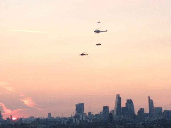 helicopter carrying car over London