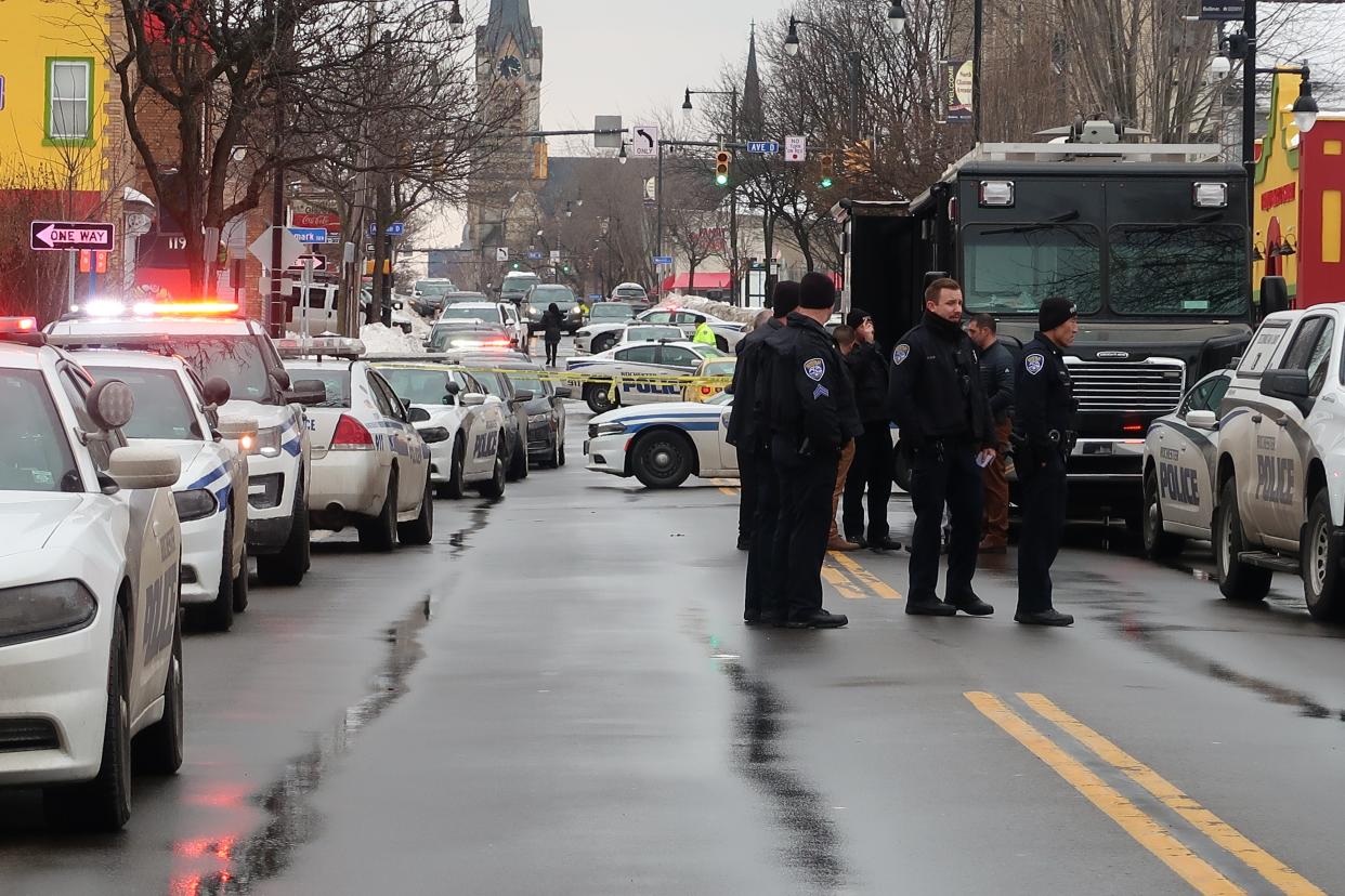 Three men were shot, one fatally, on North Clinton Avenue around 11:30 a.m. on Jan. 19. 2022. Police investigate at the scene.