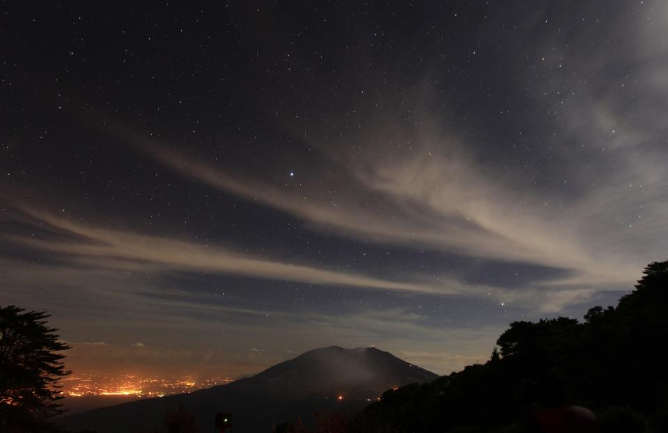 A long exposure photo shows stars above Turrialba volcano, in San Gerardo de Irazu near Turrialba