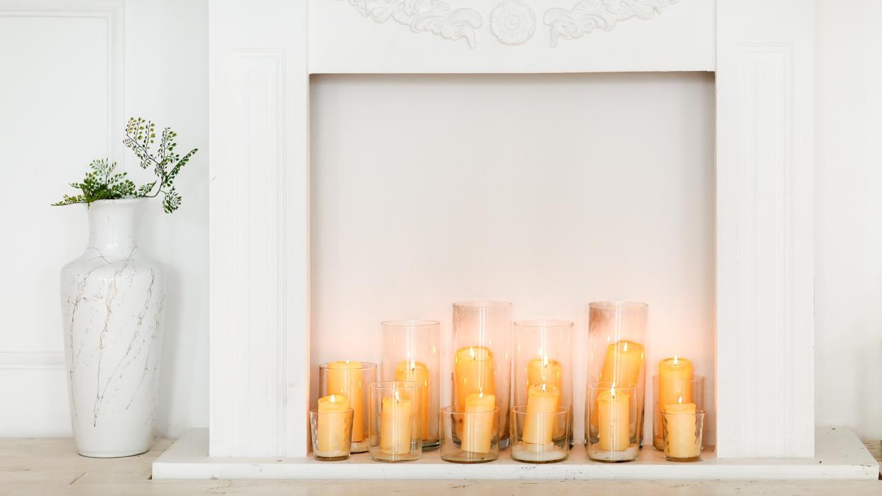 filled in fireplace with candles