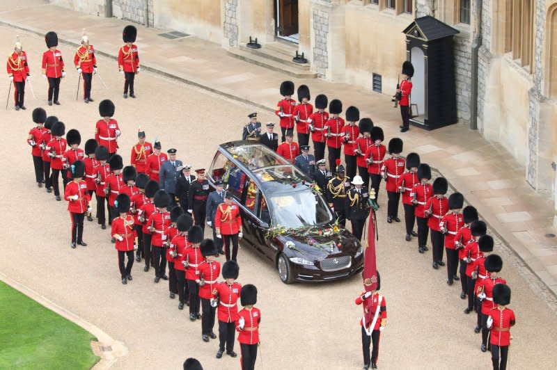 The hearse carrying the coffin of Britain's Queen Elizabeth drives into Windsor Castle ahead of the committal service held at St George's Chapel, in Windsor, England, on September 19, 2022. File Photo by Cpl. Nicholas Egan/Royal Air Force