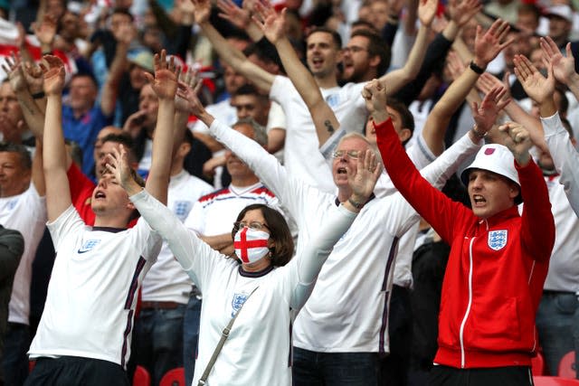 England fans celebrate during the UEFA Euro 2020 round of 16 match at Wembley Stadium