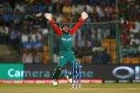 Cricket - India v Bangladesh - World Twenty20 cricket tournament - Bengaluru, India, 23/03/2016. Bangladesh's wicketkeeper Mushfiqur Rahim appeals successfully for the wicket of India's Shikhar Dhawan. REUTERS/Danish Siddiqui