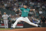 Seattle Mariners starting pitcher Yusei Kikuchi throws to an Oakland Athletics batter during the sixth inning of a baseball game Friday, July 23, 2021, in Seattle. (AP Photo/Ted S. Warren)