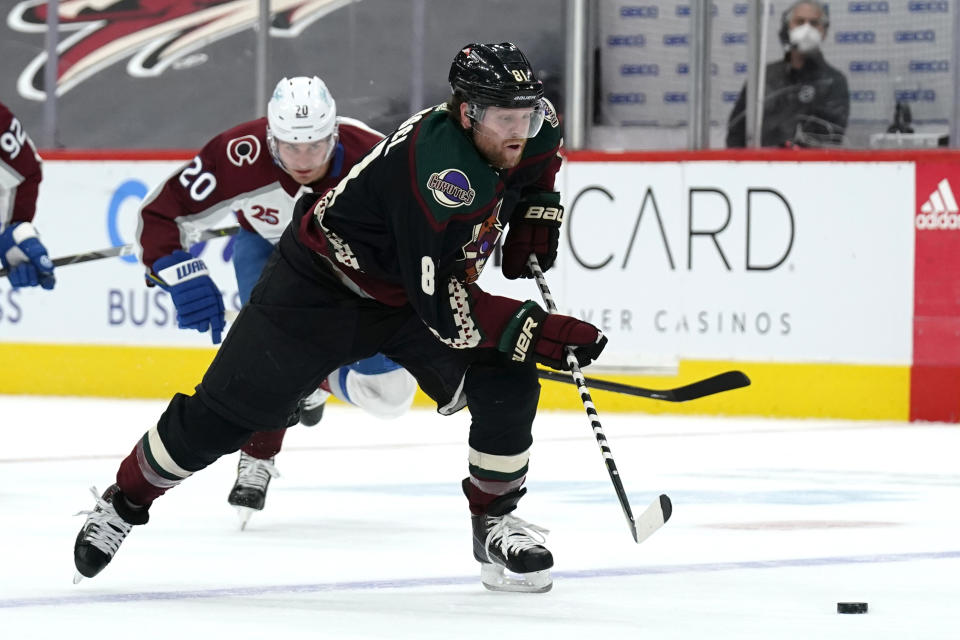 Arizona Coyotes right wing Phil Kessel (81) skates away from Colorado Avalanche left wing Brandon Saad during the third period of an NHL hockey game Tuesday, March 23, 2021, in Glendale, Ariz. Arizona won 5-4 in a shootout. (AP Photo/Rick Scuteri)