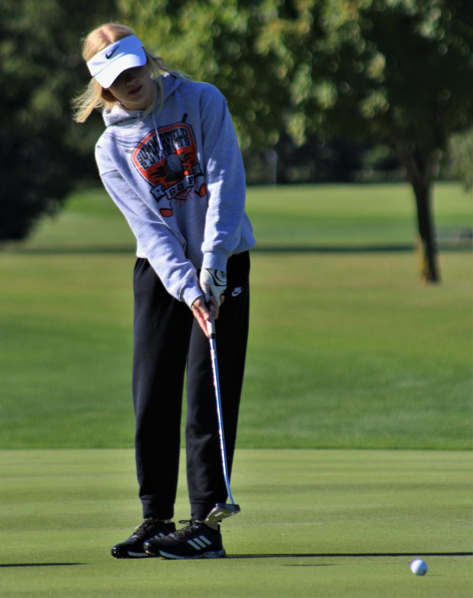 Summerfield's Delaney Hoffman sends a long putt at the No. 2 green during the Monroe County Girls Golf Championship earlier this season at Green Meadows. Hoffman qualified for state Monday in the Division 4 Regionals at Washtenaw Golf Club.