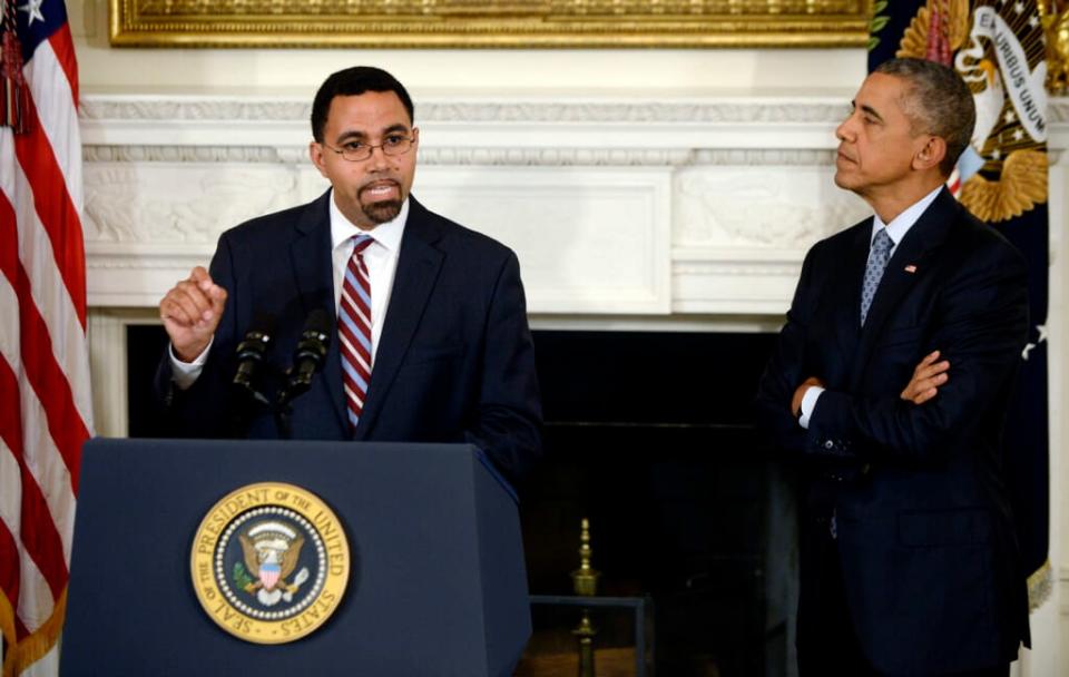 John King, former State Superintendent in New York, speaks as President Barack Obama looks on during an event to annonce that he will replace education Secretary Arne Duncan in December in the State Dining Room of the White House October 2, 2015 in Washington, DC. (Photo by Olivier Douliery/WHITE HOUSE POOL (ISP POOL IMAGES)/Corbis/VCG via Getty Images)