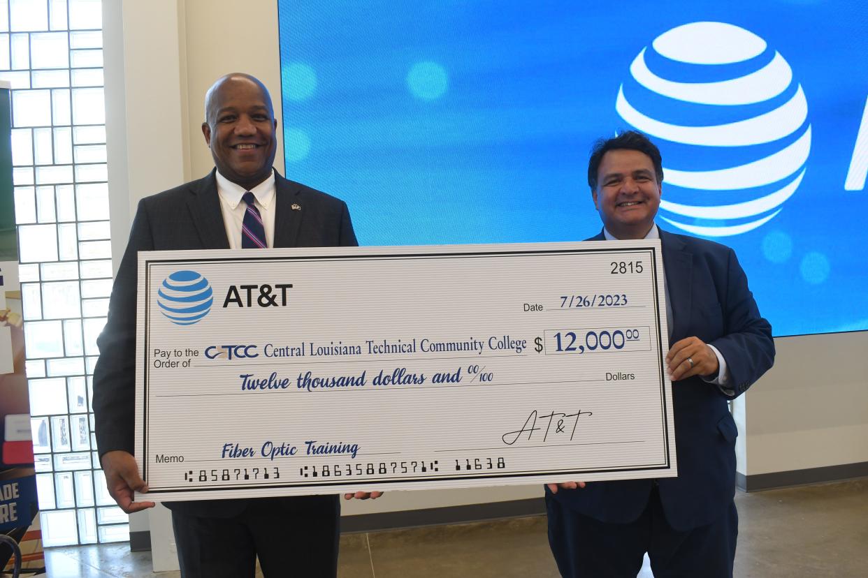 AT&T donated $12,000 to fund scholarships for a fiber optics course to be held in the fall at the Ward H. Nash campus in Avoyelles Parish it was announced at a check presentation held Wednesday. Pictured are AT&T President for Louisiana David Aubrey (left) and Central Louisiana Technical Community College Chancellor Jimmy Sawtelle.