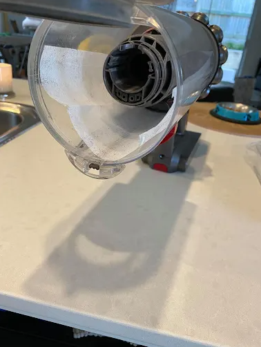 The hack was shared by a mum who said she put a Fluffy dryer sheet into the barrel of her Dyson vacuum. Photo: Facebook