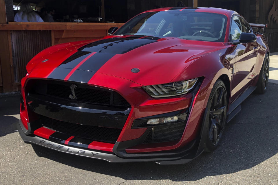 In this Tuesday, July 31, 2019, photo the the 2020 Shelby GT500 is displayed during a Ford press conference in the Detroit suburb of Clawson, Mich. The Mustang will be the most powerful street-legal Ford Mustang ever built and will go on sale this fall. (AP Photo/Tom Krisher)