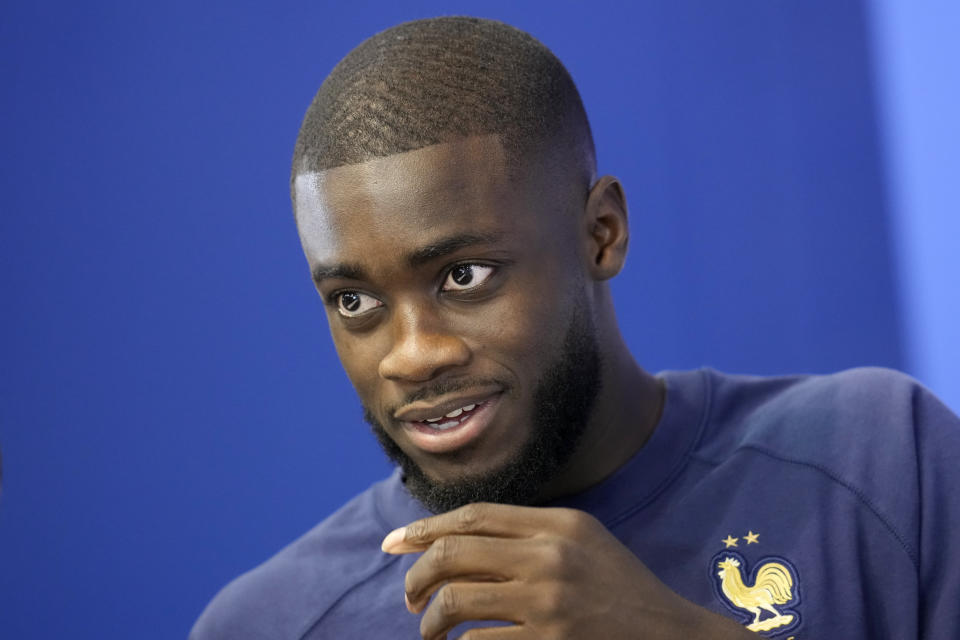 Dayot Upamecano arrives for a press conference at the Jassim Bin Hamad stadium in Doha, Qatar, Thursday, Dec. 8, 2022. France will play against England during their World Cup quarter-final soccer match on Dec. 10. (AP Photo/Christophe Ena)