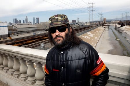 FILE PHOTO: Erik Brunetti, Los Angeles artist and streetwear designer of the clothing brand FUCT, stands for a portrait in Los Angeles