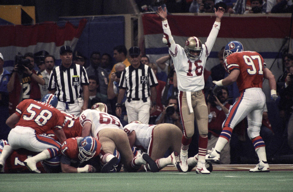 San Francisco 49ers quarterback Joe Montana (16) reacts on the field against the Denver Broncos during Super Bowl XXIV at the Superdome. The 49ers defeated the Broncos 55-10. USA TODAY Sports