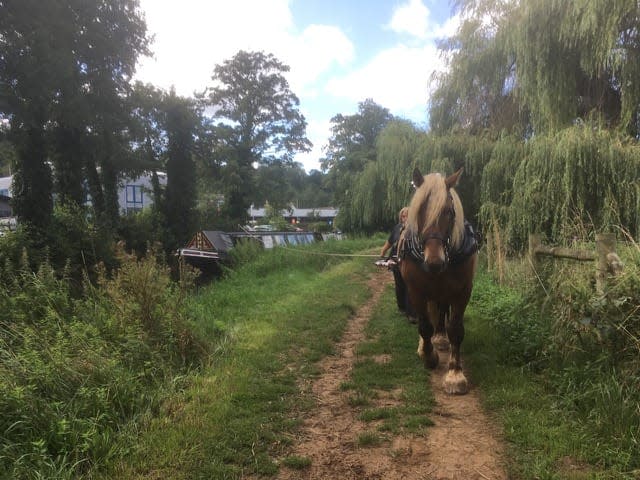 Espoir pulling the Iona along in August. (Godalming Packetbook Co)